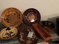 Overview of all six pieces together including platters, dishes, bowl, and loaf pan