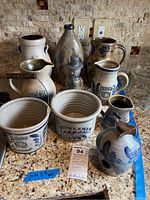 All stoneware pieces arranged on countertop