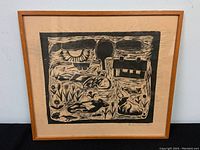 Full view of framed diptych linocut print showing abstract natural scene and signature.