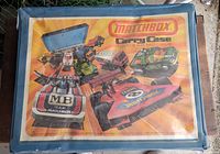 Closed carry case with Matchbox branding and images of cars on the lid.