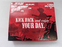 Top of red box showing cowboy silhouette and text 'Kick back and enjoy your day.'