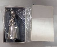 Reed & Barton Valentine Bell in original box and wrap, no signs of use.