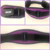 Close-up shots of the Valeo weight lifting belt showing the buckle, strap, and padding.