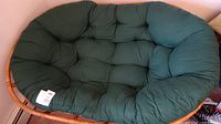 Front view of full double Papasan chair showing hunter green tufted cushion