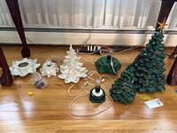 All three trees and associated bases, plus bag of colored light plugs