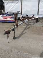 Front and side view of trailer showing tongue, jack and frame