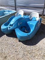 Front-right angle showing hull shape, twin pedal wells and right-side seat