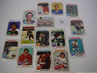 15 hockey cards from 1975 Topps featuring various NHL players and teams.