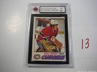 1967-78 O-Pee-Chee Michel Larocque hockey card graded 7 NM showing Larocque in Canadiens goalie uniform