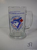 Front view of the clear glass mug showing Toronto Blue Jays logo with 1993 Division Champions text.