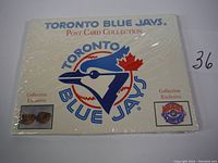 Front of sealed Toronto Blue Jays Post Card Collection showing the logo, collection exclusive, and World Series Champs insignia.