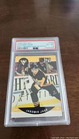 Front view of 1990 Pro Set Jaromir Jagr PSA graded hockey card in plastic slab showing player action image and PSA grade label