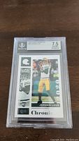 Front view of the Jordan Love 2020 Panini Chronicles rookie card in a Beckett BGS case with a grade of 7.5.
