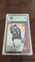 Front image of Mikko Rantanen hockey card graded PGi 10 Gem Mint in protective slab.