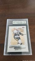 Front view of the 2008-09 Fleer Ultra Sidney Crosby rookie card encased and graded 9 by KSA, showing Crosby in Penguins uniform.