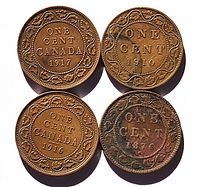 Four Canadian one cent coins dated 1876H, 1910, 1916, and 1917 displayed on white background showing obverse side with denomination and wreath design.