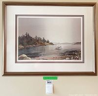 Framed and matted print with ocean and boat scene, viewed frontally showing print, matting and frame.
