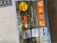 Photo of the carrying bag label showing product specifications and images.