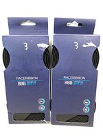 Front view of two packages of BBB RacerRibbon handlebar tape in black, showing packaging with minor wear.