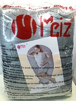 Photo showing the new sealed pregnancy body pillow in grey color inside transparent packaging with the brand name 'Mriz' and an image of a pregnant woman using the pillow.