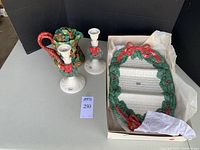 Full view of the set showing ceramic Christmas teapot, two candle holders, and serving platter inside a box with tissue paper.