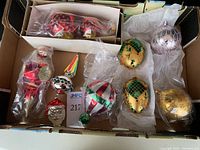 box top-down showing all 13 assorted hand-blown glass ornaments