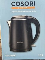 Front of the Cosori electric kettle box showing product image and model number C0172-EK with 1.7 liter capacity.