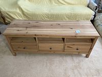 Front view of entertainment unit with drawers closed