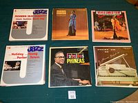 Six jazz and classic jazz related record covers shown from the lot.