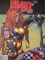 Front cover showing fantasy illustration of a woman with large gun and red hair with 'Heavy Metal' title and March 1998 date.