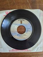 Front side of the 45 RPM vinyl record showing the 'Hotel California' track label by Eagles on Asylum Records