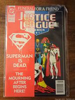 Front cover of Justice League America comic issue #70, January 1993. Shows the comic cover art and title 'Superman is Dead Funeral for a Friend'.