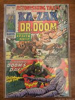Front cover of Astonishing Tales #1 comic showing Ka-Zar and Dr. Doom, with Kraven the Hunter and a tagline about Doom's Day. Comic is bagged and shows some wear with minor creases and edge wear.