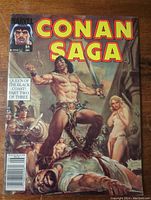 Front cover of Conan Saga comic showing muscular Conan with sword, woman, and enemies. Marvel label and issue number 51 June 1991.