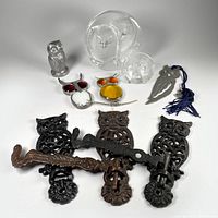 View of all nine items arranged showing the variety of owl-themed collectibles including metal handles, keychain, clip, and figurine.