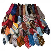 Display of 57 vintage men's neckties laid out showing variety of patterns and colors.