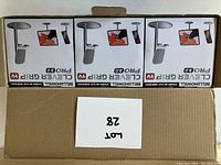 Photo showing the 3 boxed Bell+Howell Clever Grip Pro 3.0 holders stacked in a box with lot number visible.