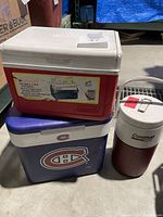 Red and white Coleman cooler, blue Canadiens cooler, and Coleman water jug shown together.