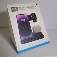 Front view of retail box showing the 3 in 1 wireless charger for iPhone, Apple Watch, AirPods with 15W fast charging and compatible devices.
