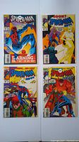 Four Spider-Man 2099 comic books laid flat, showing covers of all four issues included in the lot.