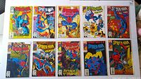 Front view of 10 Spider-Man 2099 comic books (issues #1 to #10) arranged in two rows showing colorful covers with action poses and title logos.