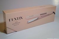 Photo of boxed Funtin hair straightener showing product image and brand on packaging.