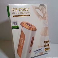 Front view of the sealed Ice-Cool IPL Hair Removal device packaging showing product and model details