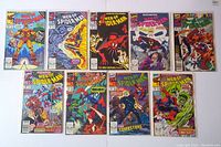 Full lot of 9 Web of Spider-Man comics laid out flat, showing front covers and issue numbers.
