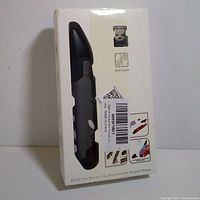 Front of box showing black pen-shaped wireless mouse with USB receiver and illustration of usage with both hands.
