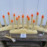 Three sets of vintage candolier electric Christmas window lights, cream plastic base, orange flame bulbs, working condition.