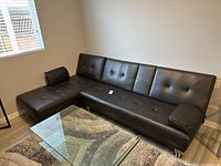 Overall view of left-side chaise lounge and right-side sofa assembled in living room