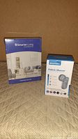 Smarter Living Furniture Care Kit and Beautural Fabric Shaver boxes on carpet.