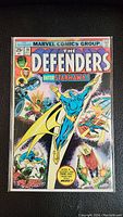 Full front cover view of The Defenders #28 comic book featuring Starhawk with price and issue number visible.