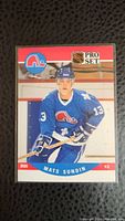 Front image of the Mats Sundin rookie card showing him in Quebec Nordiques blue uniform, with team logo and card details.